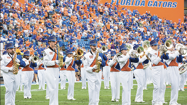 gator marching band on field during a football game