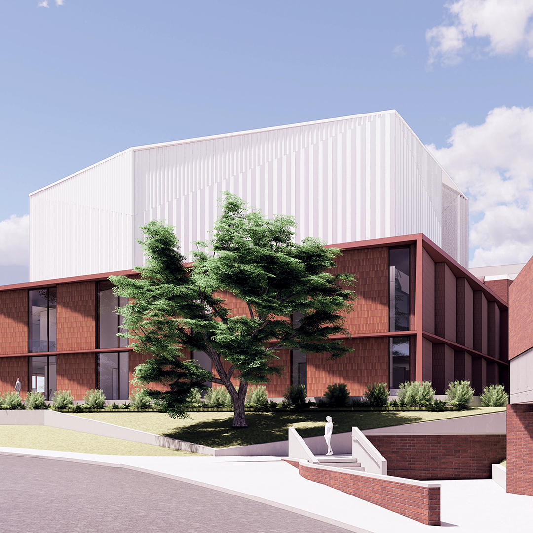 brick building with white gleaming addition housing our new concert hall